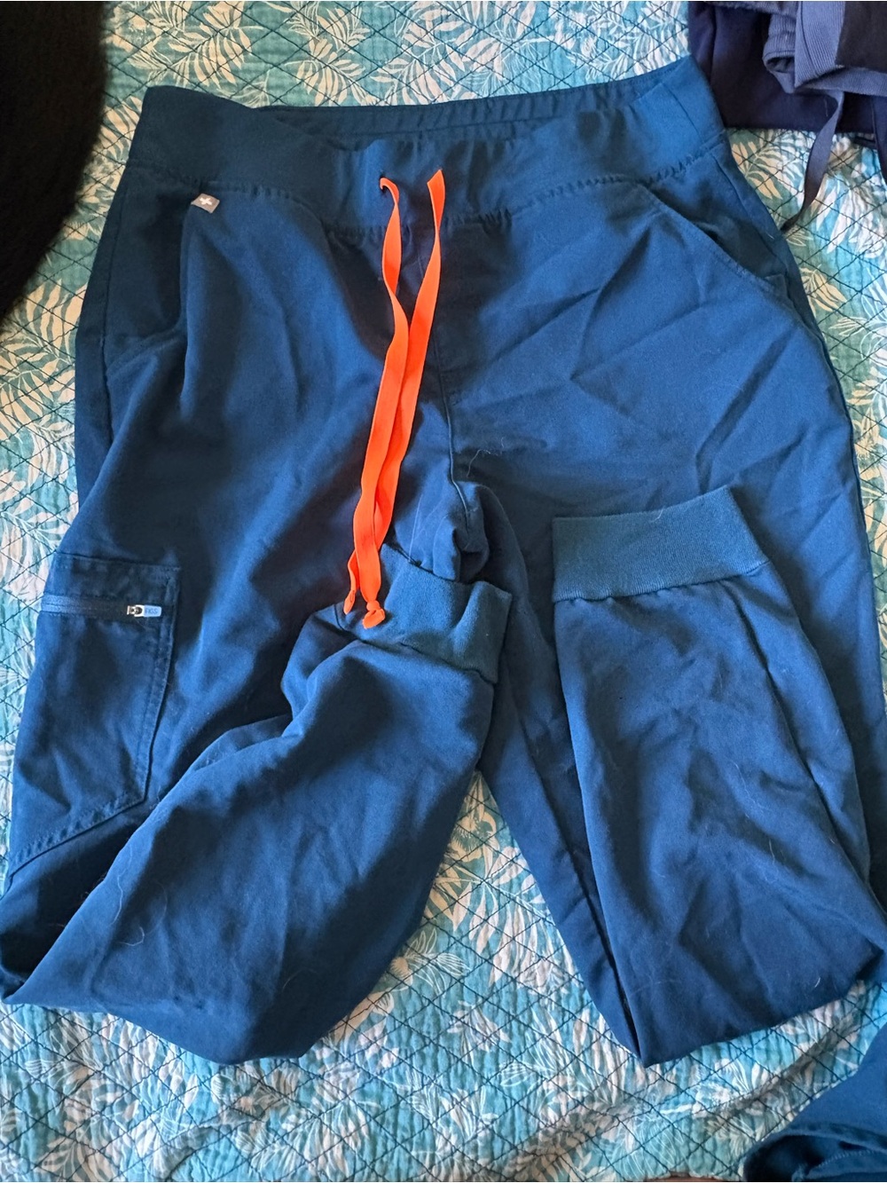 FIGS Navy Blue Jogger Scrub Pants with Orange Drawstring and top